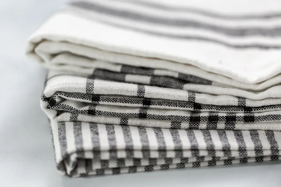 Various uses of huckaback linen in bathroom, kitchen, and travel