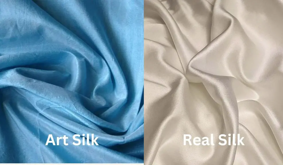 Blue art silk fabric compared with ivory real silk fabric to show differences in shine and richness