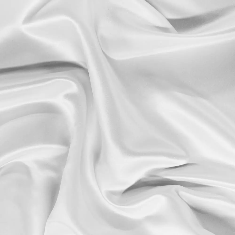 White duchess satin fabric with structured folds and elegant sheen