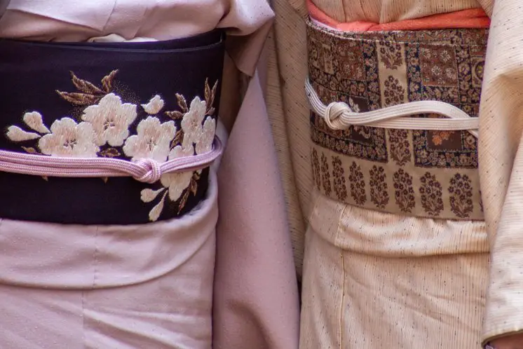Close up of traditional Japanese kimono obi belts decorated with patterns and embroidery