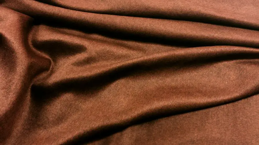 Close up of vicuña wool fabric representing traditional Andean textile heritage