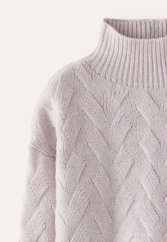 Lambswool knit sweater showing warmth, softness, and classic texture
