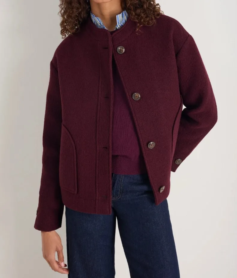 Woman wearing a boiled wool jacket showing soft structure, warmth, and casual outerwear style