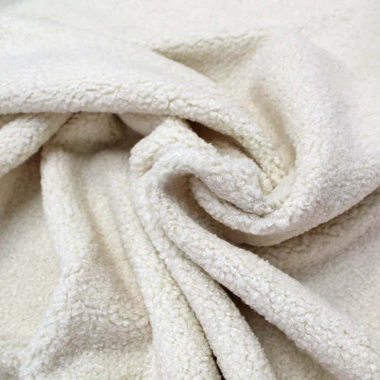 Textured bouclé fabric with looped yarn surface in neutral tones