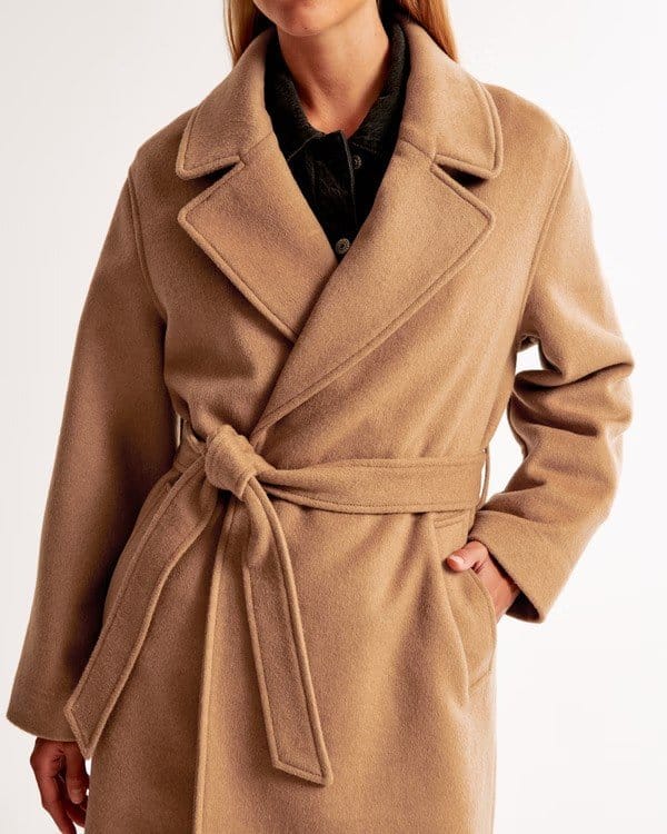 Winter coat made from double cloth wool showing tailored structure and smooth finish