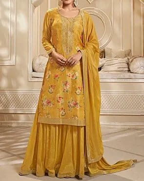 South Asian outfit made with jacquard chiffon featuring embroidered details and flowing layers