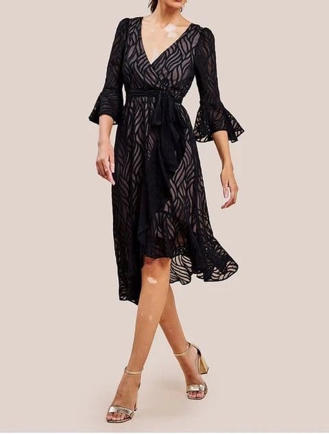 Black jacquard chiffon evening gown with sheer fabric and flowing layered silhouette