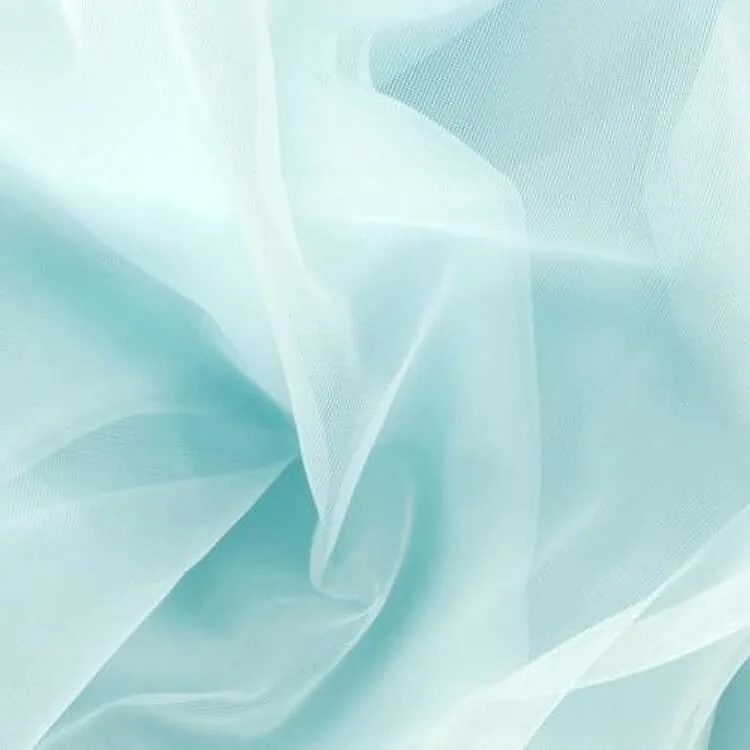 Close up of light blue sheer nylon chiffon fabric showing fine weave, transparency, and flowing texture