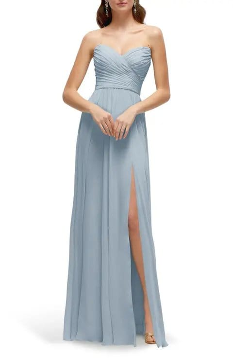 Light blue nylon chiffon evening gown with strapless bodice and flowing skirt showing elegant drape and soft movement