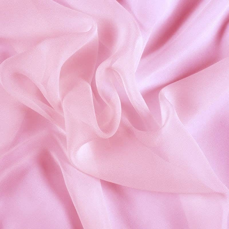 Soft pink silk chiffon fabric folds representing the heritage and evolution of silk chiffon textiles