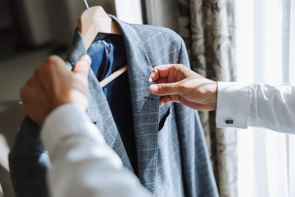 Proper handling and care of a wool suit jacket on a hanger