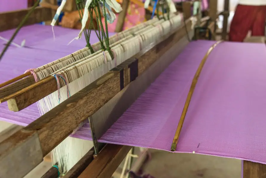 Traditional textile loom producing high quality wool fabric