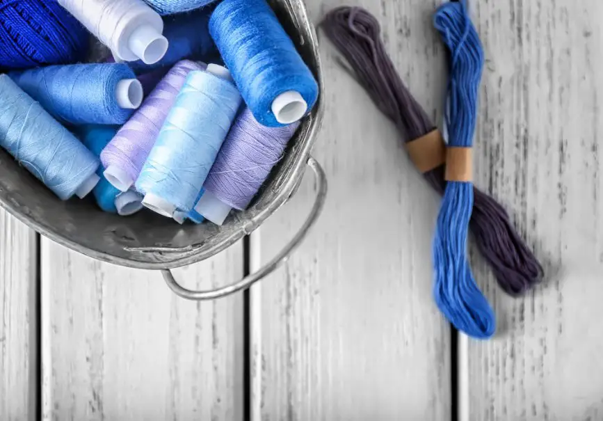 Finished garments and fabric stacks representing clothing ideas made with wool challis fabric