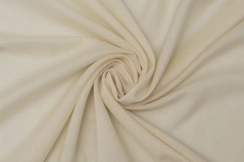 Close up view of wool delaine fabric showing smooth texture and elegant drape