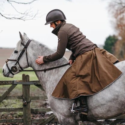 Traditional women's riding habit made from wool broadcloth worn during horseback riding