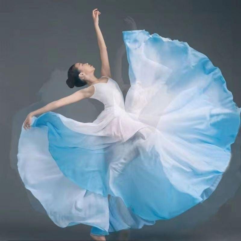 Dancer wearing flowing chiffon costume during a performance