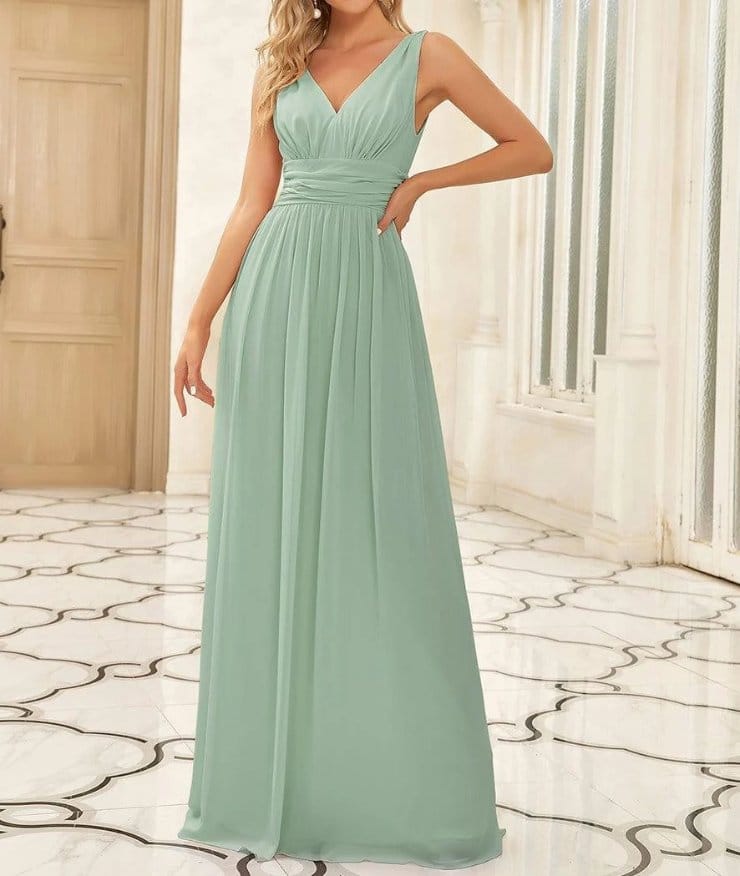 Long chiffon evening gown in soft green with flowing skirt