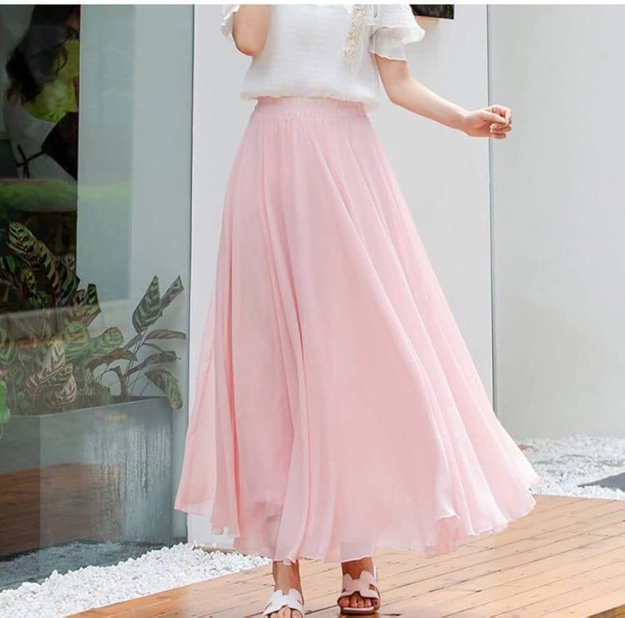 Soft pastel chiffon skirt with flowing pleats creating a lightweight and airy silhouette