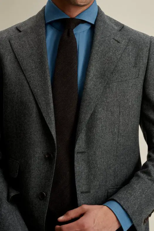 Tailored wool flannel suit highlighting texture and classic styling