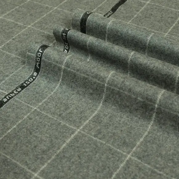 Close up of wool flannel fabric showing soft brushed surface and weave detail