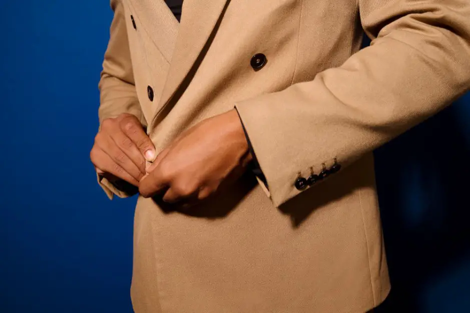 Beige wool gabardine blazer demonstrating fabric use in tailored outerwear