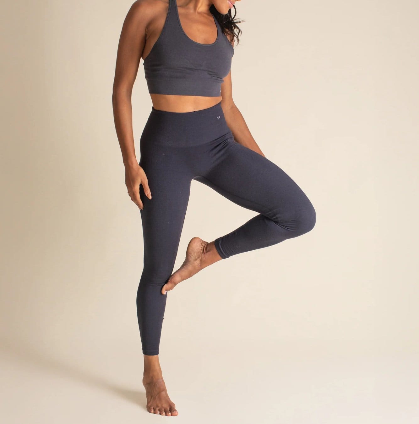 Yoga top and leggings made from wool jersey fabric showing stretch and flexibility