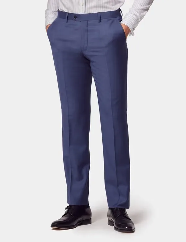 Wool sharkskin suit trousers showing tailored fit, clean crease, and smooth fabric drape. Credit: Hawes & Curtis