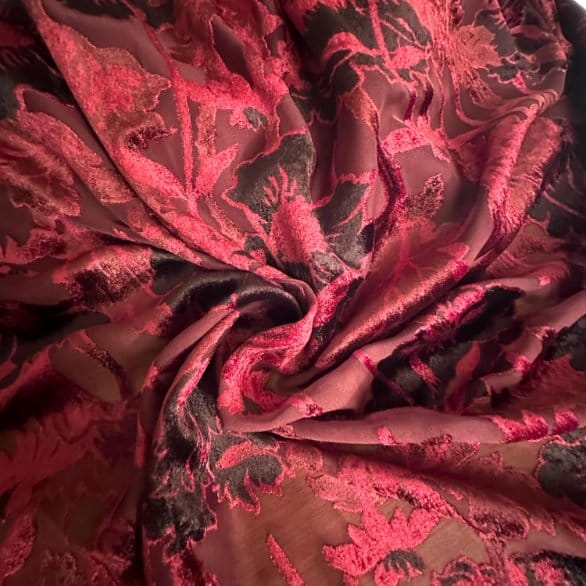 Rich red devoré velvet with raised and sheer floral design