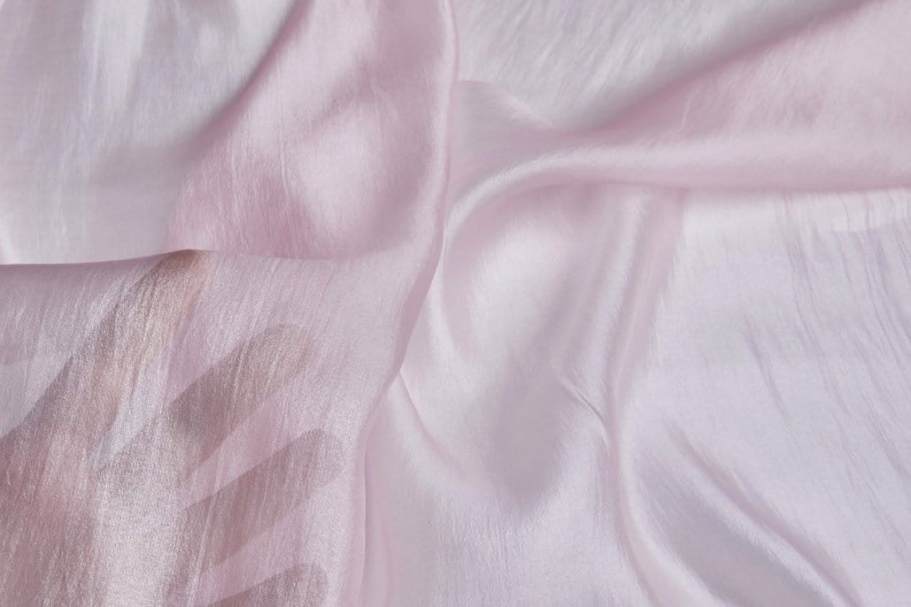 Close view of sheer crinkle chiffon showing even texture and transparency