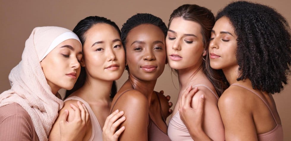 Diverse women with different skin tones styled in soft neutral shades for 2026 color matching guide