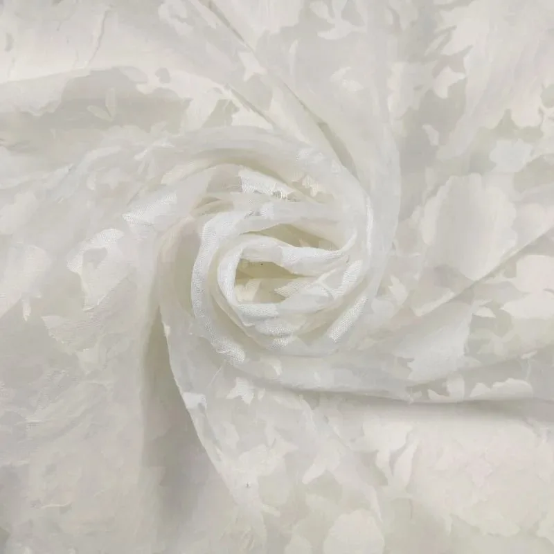 Burnout chiffon fabric showing devoré pattern with contrasting sheer and textured opaque areas