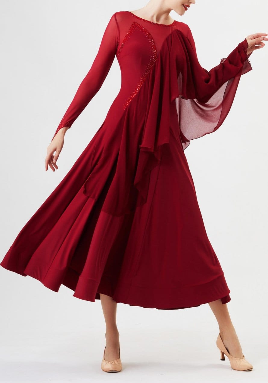 Red crepe chiffon dance dress with flowing layered skirt showing dramatic movement and graceful drape during motion