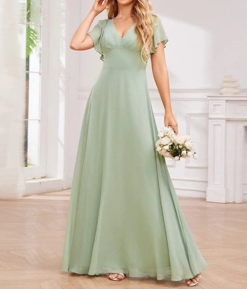 Light green floor length bridesmaid dress made from double face chiffon with soft flutter sleeves and flowing skirt