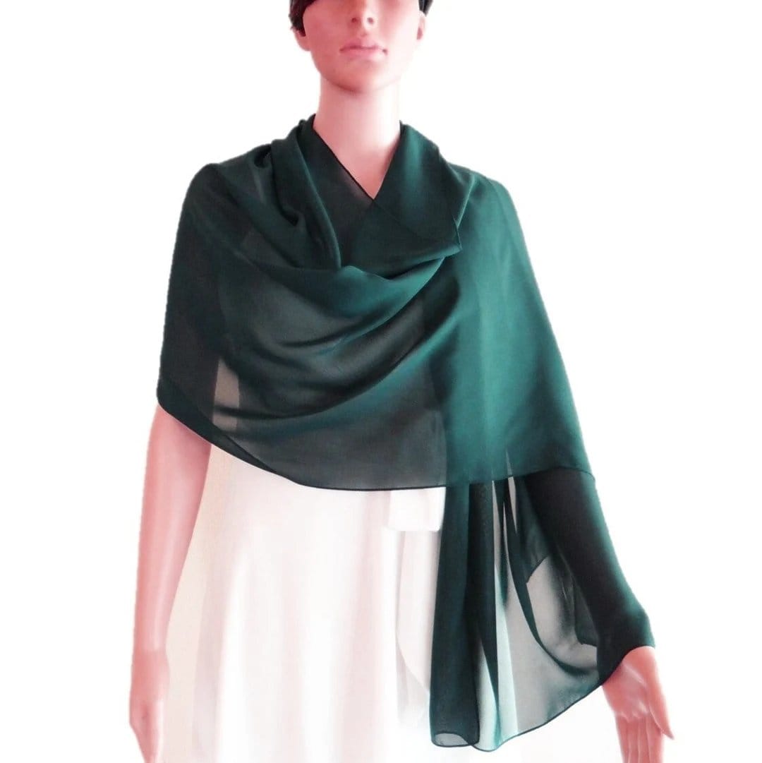 Dark green sheer double face chiffon shawl draped around shoulders, showing lightweight transparency and elegant layering