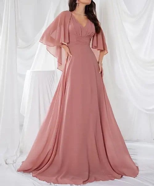 Dusty rose pearl chiffon bridesmaid dress with flowing floor length skirt and soft flutter sleeves, showing elegant drape and graceful movement
