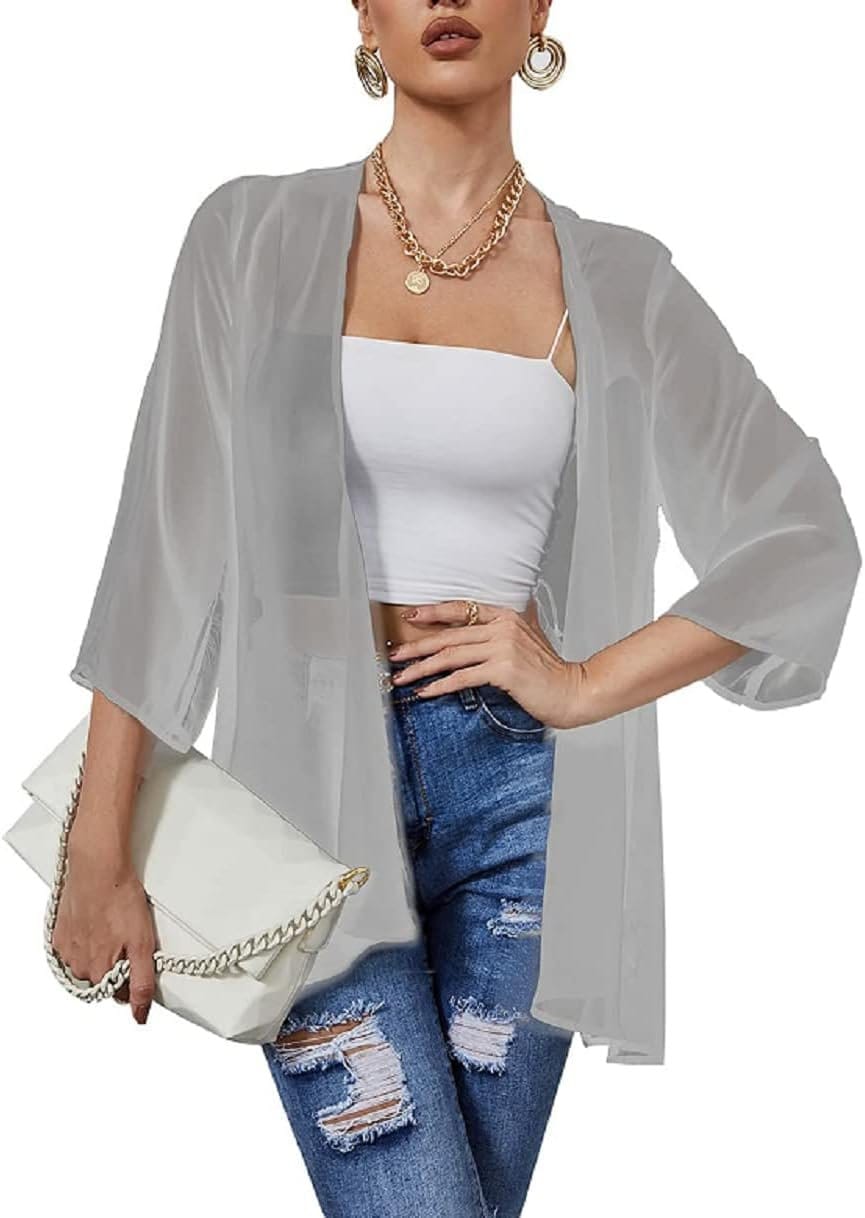 Sheer gray polyester chiffon cardigan layered over white top and jeans showing lightweight breathable summer fashion styling