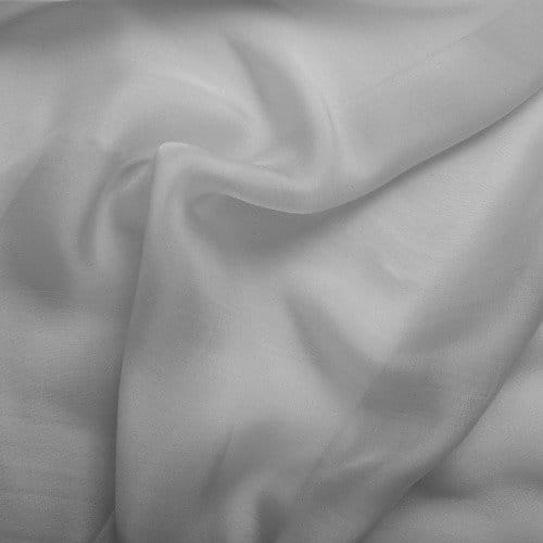Soft gray silk pearl chiffon fabric with smooth luxurious texture and delicate flowing drape