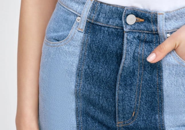 Two tone denim fabric showing contrasting light and dark blue panels