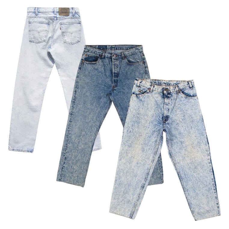 different styles of acid wash denim jeans showing variations in wash intensity and design options