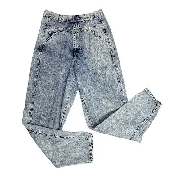 acid wash denim jeans flat lay showing vintage washed texture and tapered fit style