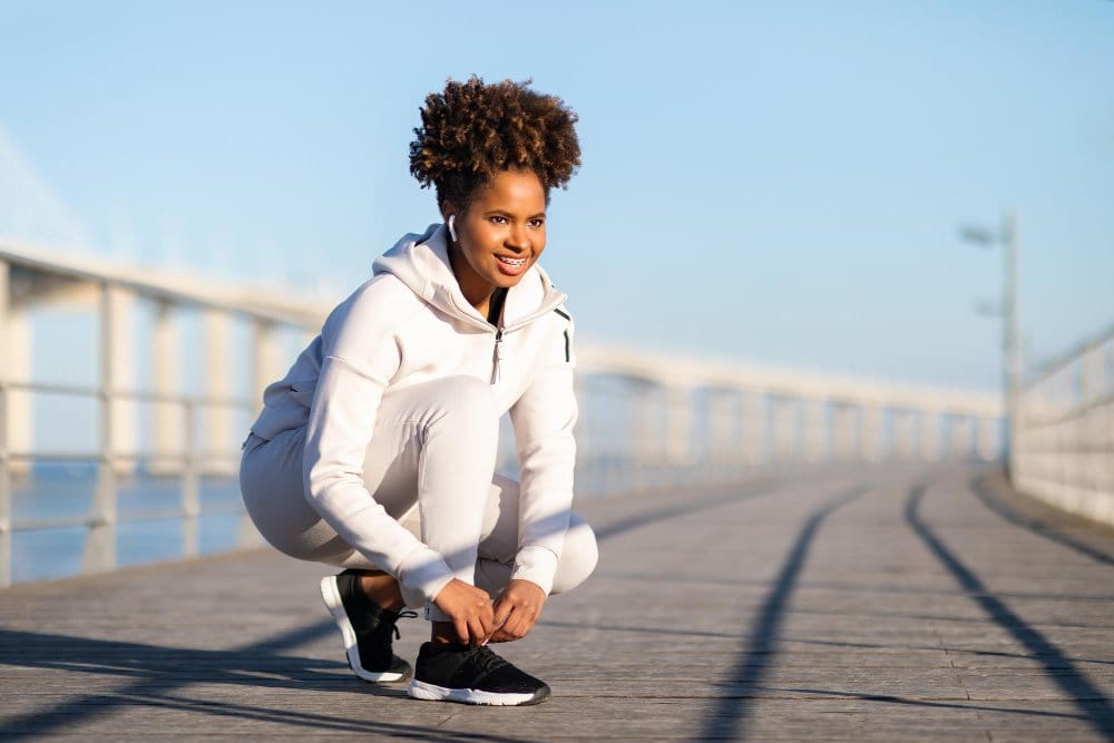 Woman wearing stylish athleisure clothing combining comfort and modern fashion.