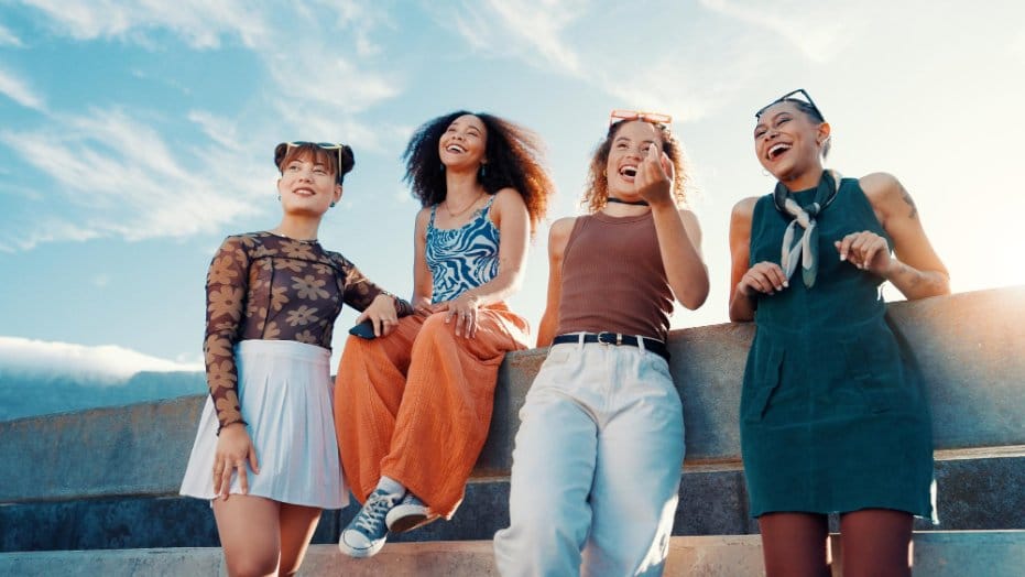 Group of friends wearing casual clothing containing small amounts of spandex for comfort.