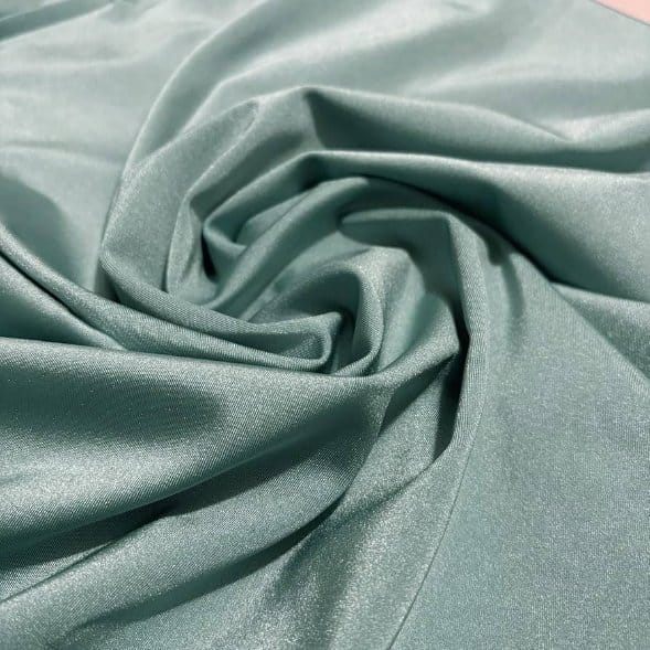 Smooth nylon spandex fabric illustrating textile properties studied in fashion and apparel education.