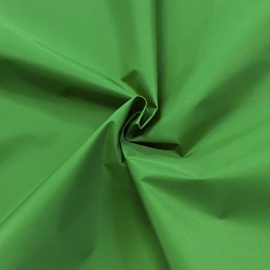 Bright green nylon taffeta fabric with a smooth, crisp finish often used in jackets, linings and outdoor apparel.