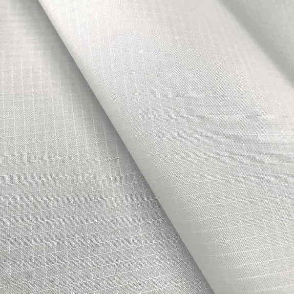 White ripstop nylon fabric featuring a reinforced grid pattern designed to prevent tears and improve durability.