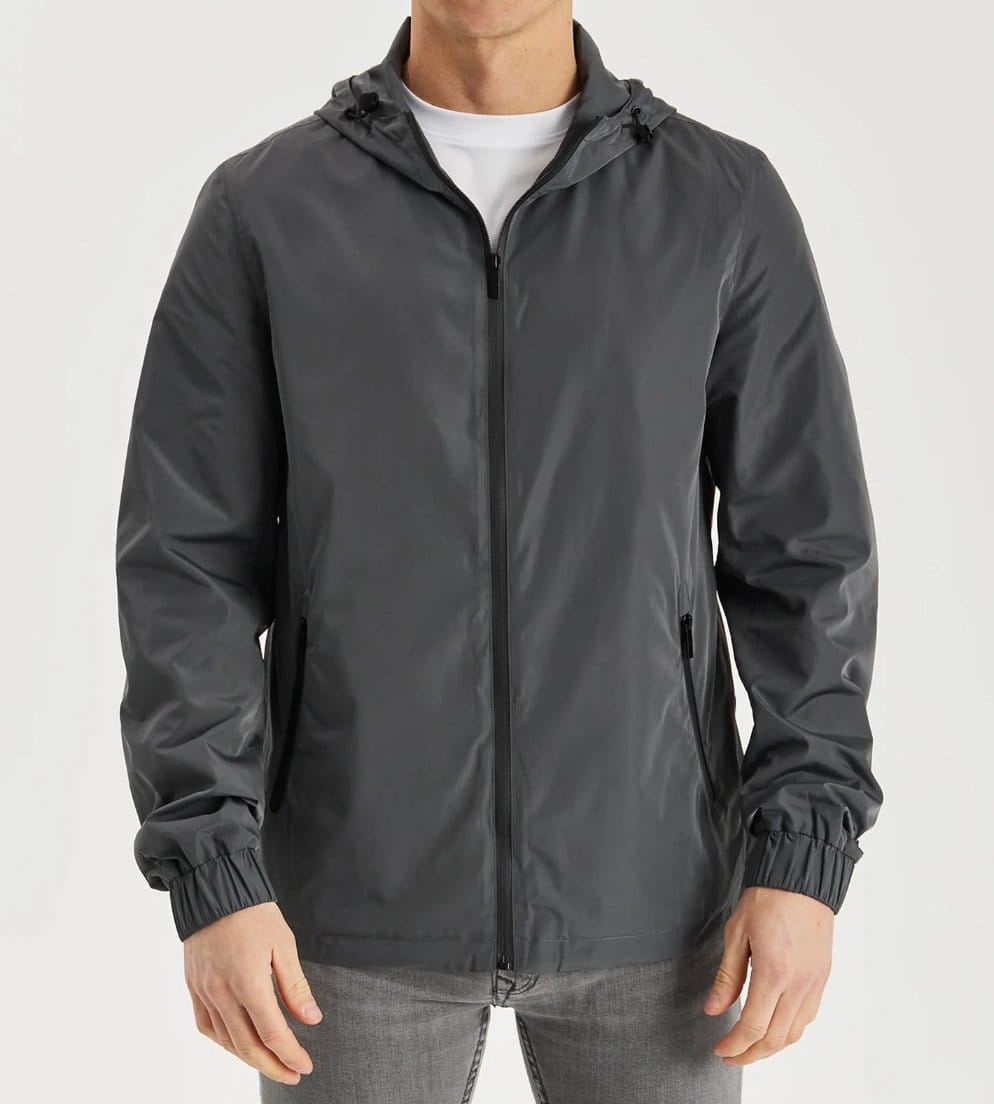 Grey nylon hooded jacket designed for lightweight weather protection, durability and everyday outdoor wear.
